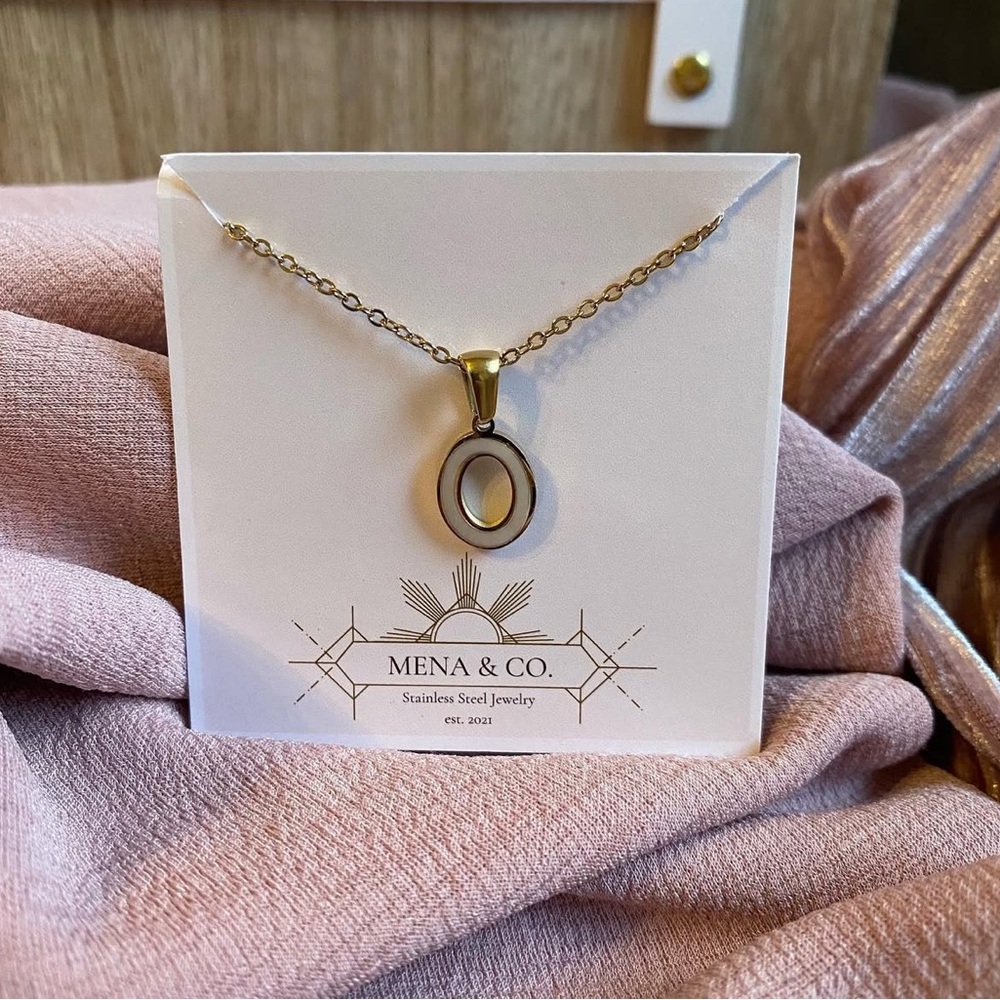Gold Stainless Steel “O” Initial Pendant Necklace with a white inlay.
